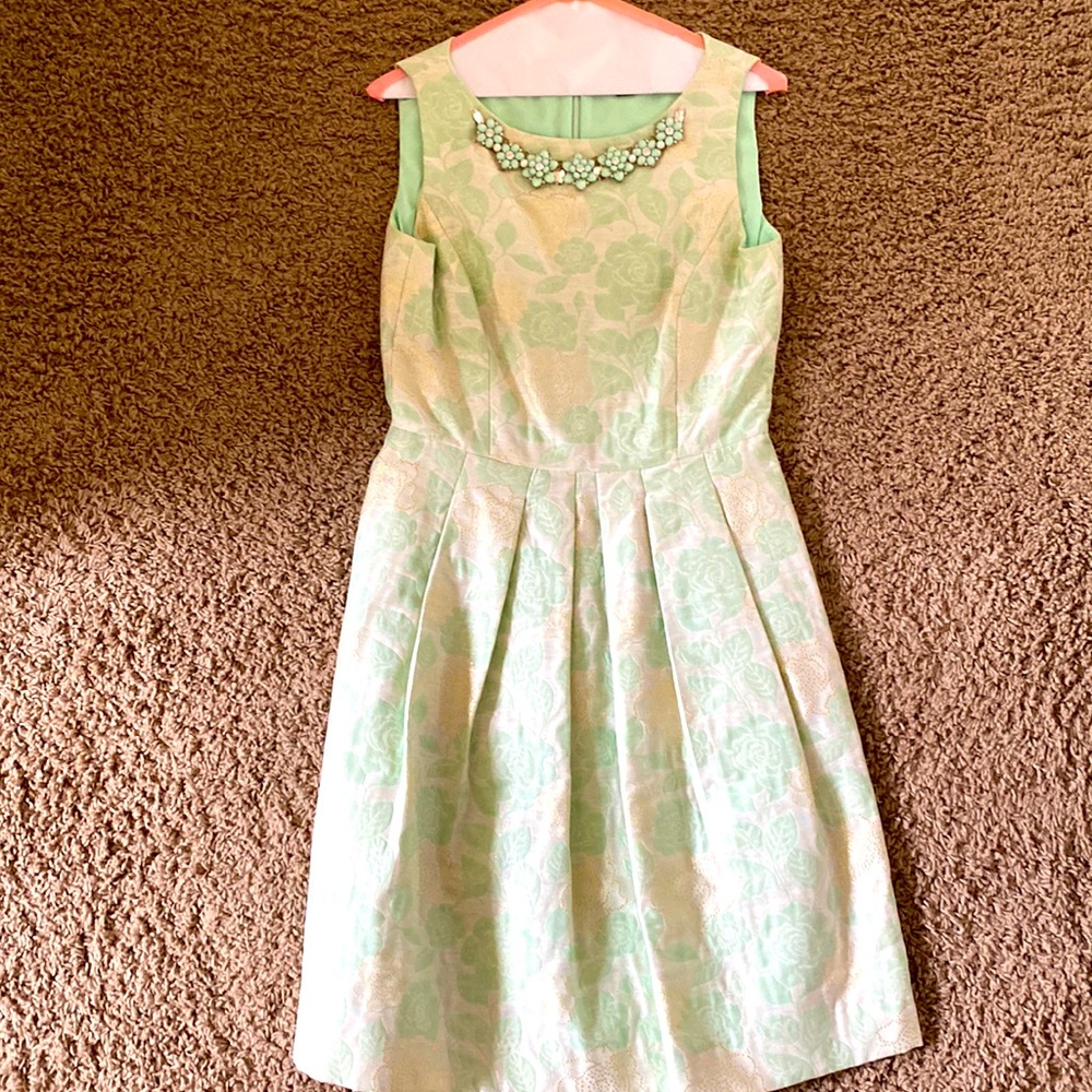 Tahari fit and flare mint dress with faint gold accented flowers